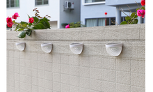 Load image into Gallery viewer, Solar LED Wall Spots - Hong Kong Rooftop Party