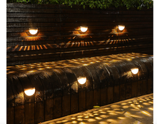 Load image into Gallery viewer, Solar LED Wall Spots - Hong Kong Rooftop Party